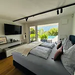 Апартаменты Place2be - With Infinity Pool